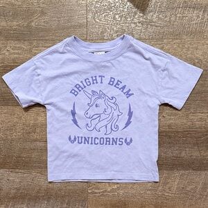 Hanna Andersson Short Sleeve Varsity Graphic Tee in “Unicorn Team” Print